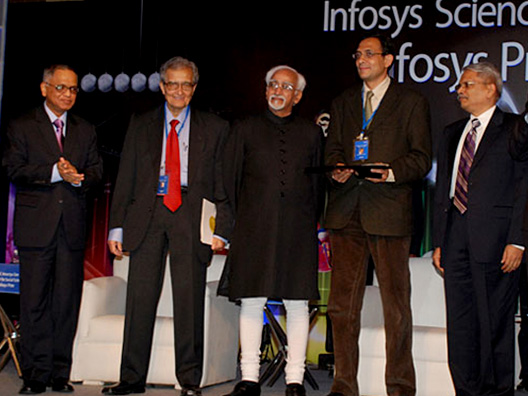 Professor Abhijeet Banerjee receiving the Infosys Prize in Social Sciences - Economics