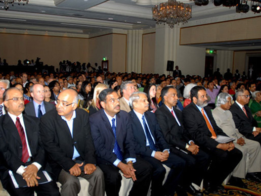 Dignitaries and guests watch the Infosys Science Foundation video