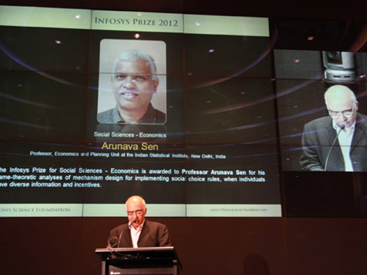 K. Dinesh, Trustee, announces the Infosys Prize 2012 Social Sciences - Economics Laureate, Prof. Arunava Sen