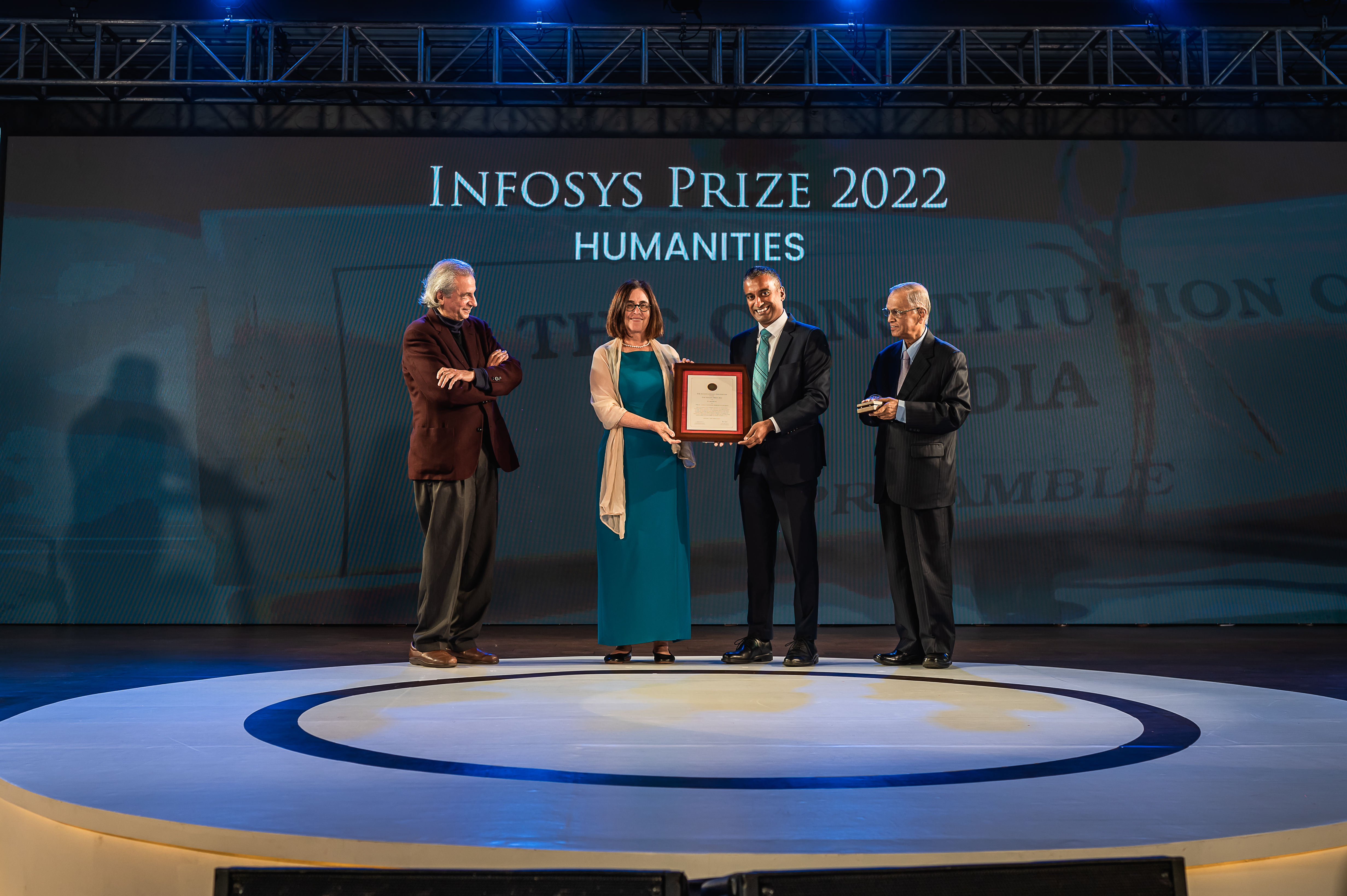 Prof. Akeel Bilgrami, Prof. Shafi Goldwasser and Mr. Narayana Murthy presenting the Infosys Prize 2022 to Prof. Sudhir Krishnaswamy