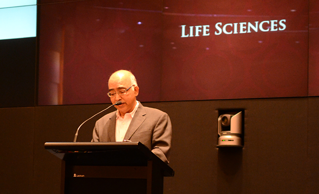 K. Dinesh announces the winner of the Life Sciences category