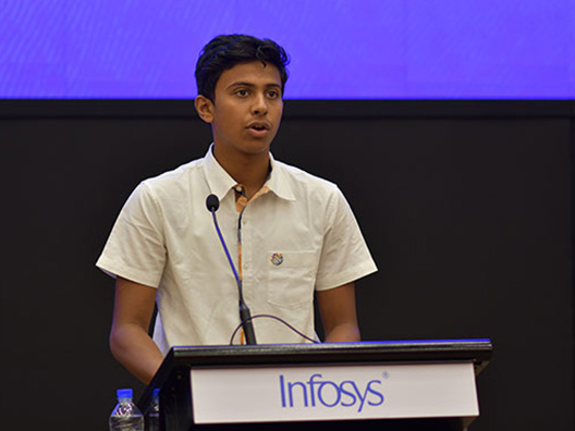 Aadi Narayan from Oakridge International School announces the winner of the Infosys Prize 2018 in Engineering & Computer Science