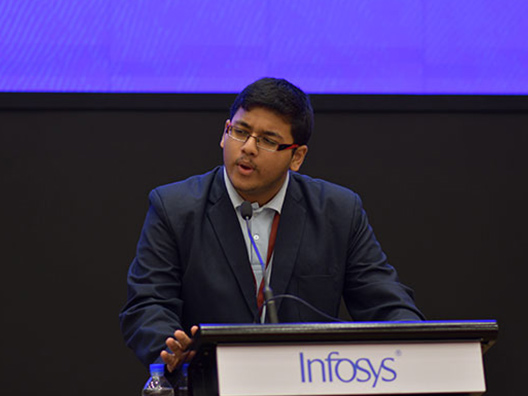 Rangan Ray from Sishugriha High School announces the winner for Infosys Prize 2018 in Social Sciences