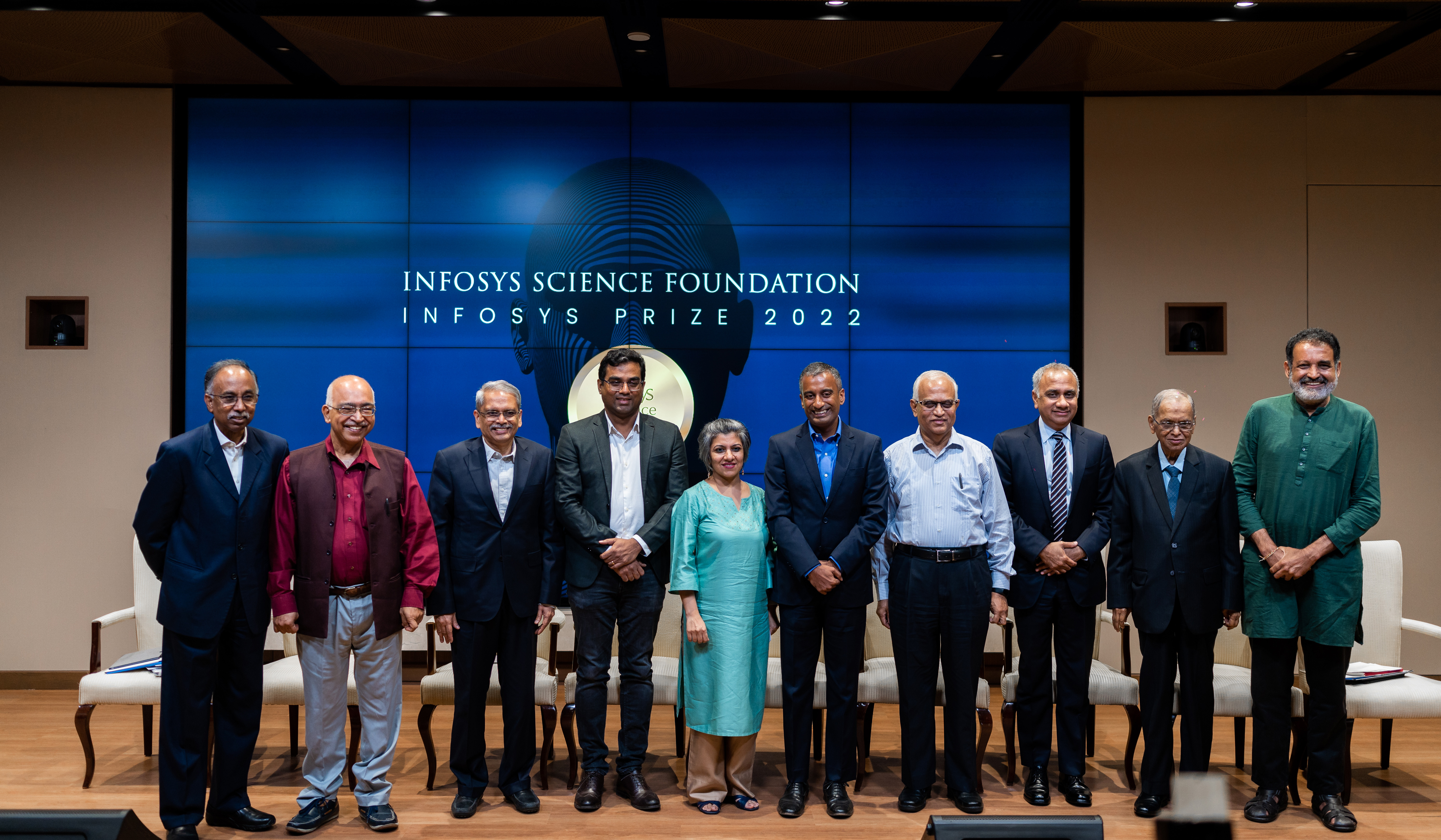 The Board of Trustees of the Infosys Science Foundation with the 2022 Infosys Prize laureates, Mahesh Kakde, and Sudhir Krishnaswamy