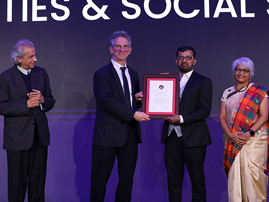 Prof. Akeel Bilgrami, Prof. Peter Sarnak, and Dr. Pratima Murthy presenting the Infosys Prize 2024 to Prof. Mahmood Kooria