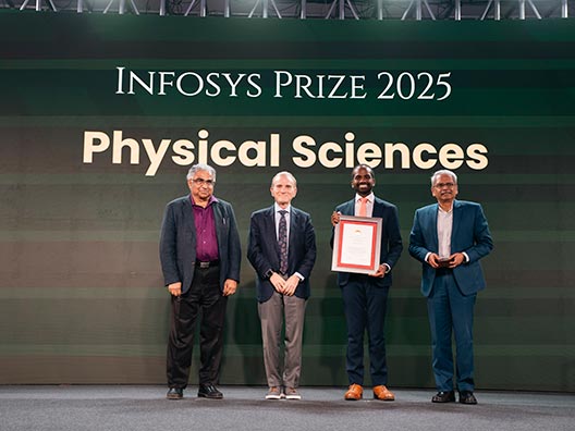 Prof. Shrinivas Kulkarni, Prof. Randy Schekman, and Mr. Kris Gopalakrishnan presenting the Infosys Prize 2025 to Prof. Karthish Manthiram