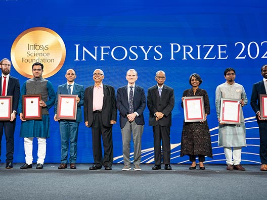 Prof. Randy Schekman, ISF President Mr. K. Dinesh and ISF Trustee, Mr. Narayana Murthy with the 2024 Infosys Prize Laureates
