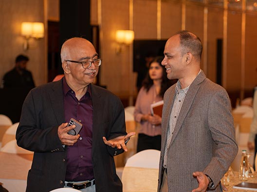 ISF President Mr. K. Dinesh and 2025 Mathematics Winner Sabyasachi Mukherjee at the Infosys Prize Winners’ Symposium 2025